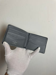 Louis Vuitton taiga leather slender wallet